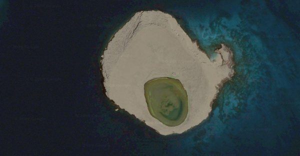 Изумрудная чистота озера на острове Рокас Бейнбридж (12 фото)